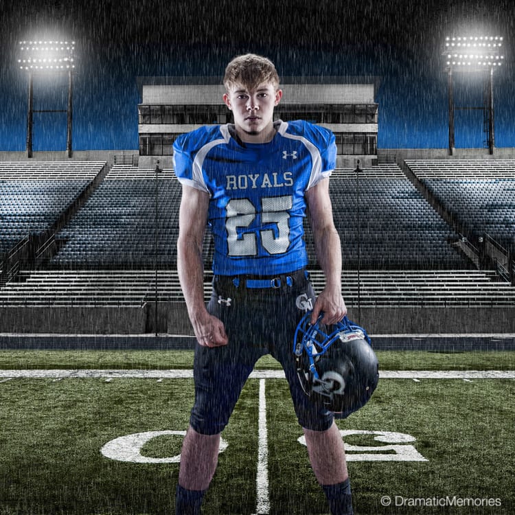 Sports Senior Pictures Football Player on Rainy Football Field