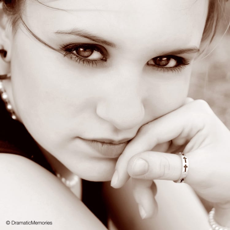 Senior Portraits Sepia Closeup of Girl with Cross Ring